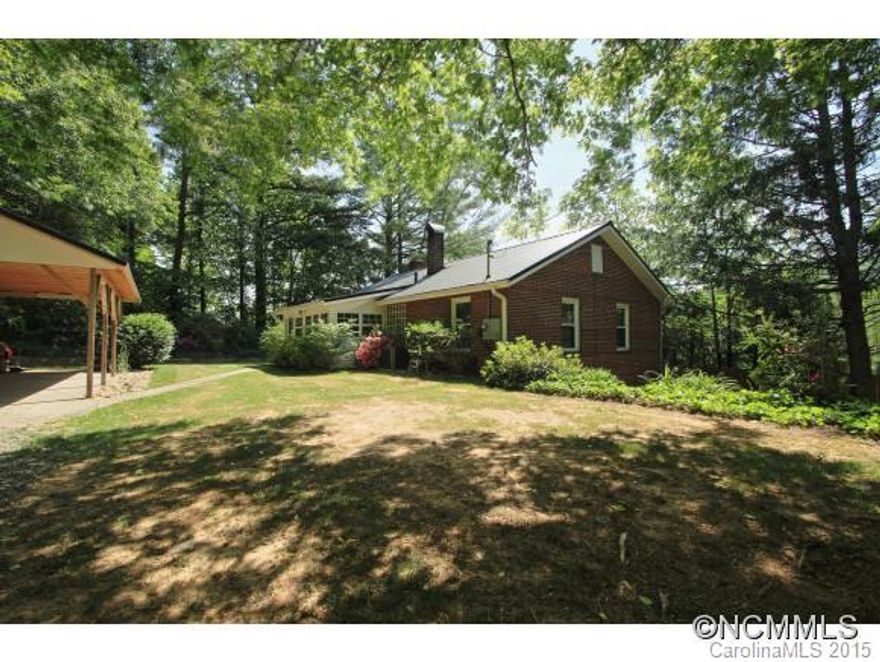 House, Mini Farm, Commercial, Multifamily, this property offers all these uses. Only 2.4 miles to Main Street Brevard & totally unrestricted property on paved road. Where else can you find an all brick, remodeled home, that's ready to move in? Offers: full unfin basement, carport, pasture, outbuildings, more home sites, views, gardens, hardwood, flag stone, tile floors, metal roof, fire pit, privacy fence & the list goes on & Impeccable condition