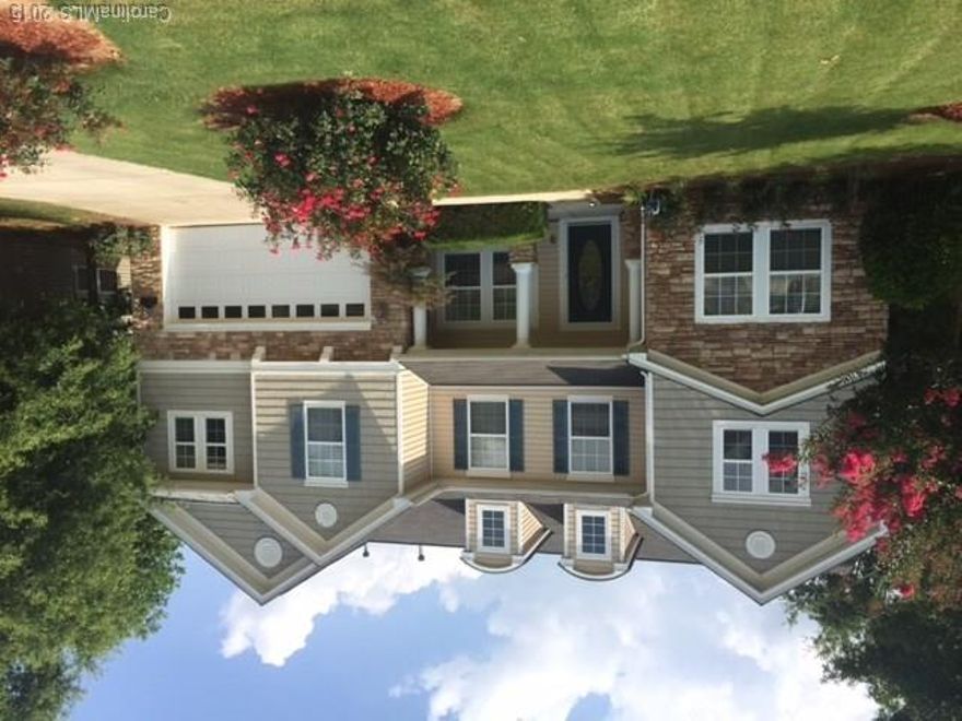 Spacious open floor plan with huge master suite.  Natural decor with some accent color. Ceramic tile flooring on first floor and master bath.  Granite countertops and stainless appliances. Bricked patio with gazebo, fountain, and fenced in back yard that is s great for entertaining. Great commuting to I-77 and Fort Mill Springfield Parkway.  10 minutes to Carolina Place Mall, Carowinds, and Cabela's.  Local dining close by.