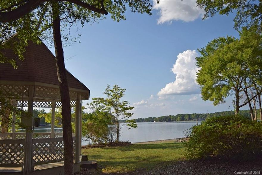 Wonderful view, wonderful value! Waterfront home on the Allison Creek peninsula of Lake Wylie. Four bedrooms and big level lot with new boat dock. Relax in the lakeside gazebo and enjoy the beauty of the lake. Hardwood floors throughout the home.  Vintage pine cabinets in the kitchen, tile in baths. Master plus 2nd bedroom on main level, plus 2 bedrooms upstairs. Home is ready for you to update and fix up a bit to make it your own! Excellent Clover schools. low cost of living with SC taxes.