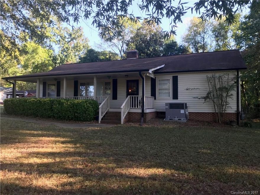 Freshly painted, tucked back off road, fenced lot, covered parking! Must see to appreciate. Home is being sold "as-is". No repairs to be done! House currently on well next door but city water available.