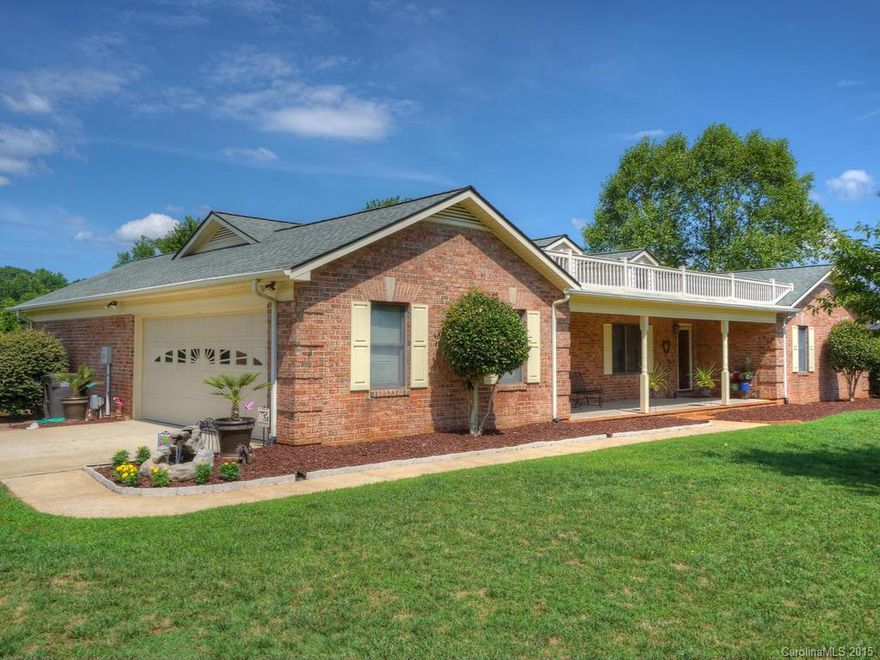 REDUCED!! Wonderfully appointed All BRICK ranch home in Davidson Downes area of Mooresville!  This amazing home sits nicely on .57 acres of land with a scenic screened in porch complete with HOT TUB and area for taking it easy after a long hard day of work! Inside you will find beautiful HARDWOOD FLOORS throughout most of the home, new stainless and black appliances, an extra large family room perfect for billiard room and centrally located near EVERYTHING! Must See it Today!