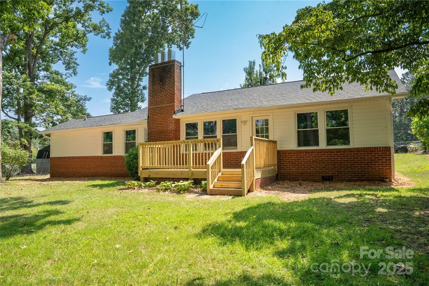 Looking for a move-in-ready home with charm and modern updates? This beautifully renovated 3-bedroom, 2-bathroom home is located just one street over from the beloved Brookwood Park—featuring scenic walking trails and a a playground. Step inside to find a fresh, stylish interior with Luxery Vinyl flooring throughout, fresh paint, a brand-new HVAC system, water heater, roof and windows. The updated kitchen boasts new cabinets, a tile backsplash, granite countertops, and stainless steel appliances—perfect for both everyday living and entertaining. Outside, the .35-acre lot offers mature trees, a detached 1-car garage, and fantastic outdoor spaces including a brand-new front deck and an expansive back patio ideal for relaxing or hosting guests. Don't miss your chance to own a fully remodeled home in one of Landrum’s most walkable and charming neighborhoods!