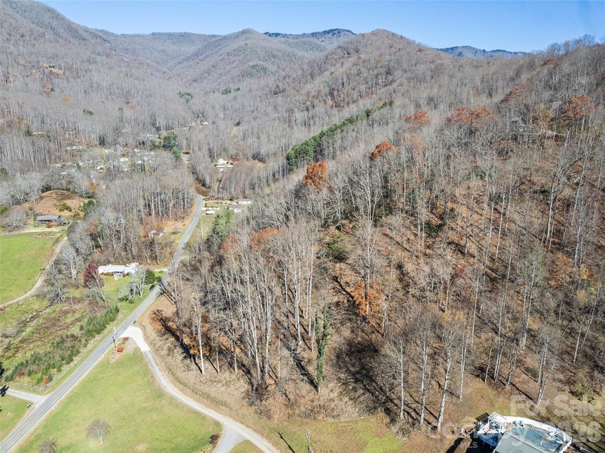 Accessible & buildable lot on the desirable Fisher Creek Rd in Sylva! The survey, perc test & clearing are already done for you- an incredible opportunity to build in the mountains! TR 4: LT 5 (PIN 7653-10-5886) and other adjoining parcels are available for purchase: TR 1: Lot 1 (PIN 7653-115316); TR 2: LT 3 (PIN 7653-11-4158); and TR 3: LT 4 (PIN 7653-11-4073). Jackson Co. tax value on these newly split lots determined in 2026; 2025 taxes have been paid. Seller will determine restrictions at closing when new deed is written. Seller is a licensed general contractor- an option for your custom home!
