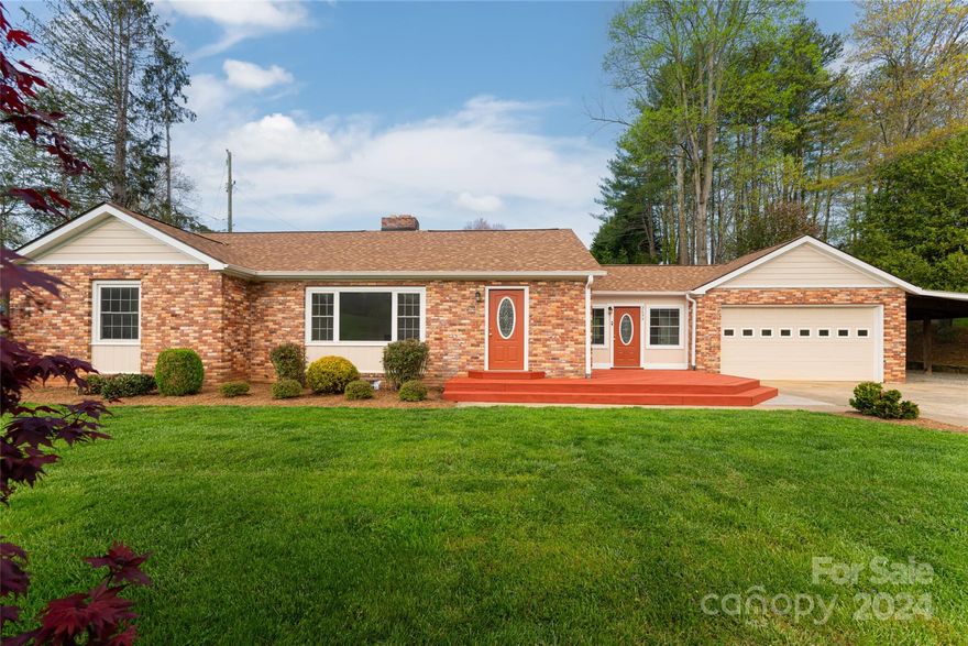 Recently updated, this exceptional classic brick home offers convenience and value to the next owner. The timeless floor plan with large rooms, natural light, refinished hardwood floors, paint, updated kitchen with stainless steel appliances and silestone counters, bathrooms, windows, roof, heat pump, and hot water heater that all complement the traditional features like a wood-burning fireplace, a large basement with both inside and outside entrances offering a bonus room not counted in the square footage, lots of covered outdoor storage for vehicles or hobbies, a main level attached two car garage, and a private backyard with outdoor fire pit. This home is close to shopping, dining, groceries, breweries, hardware, and more. Entertain friends and family, grow a garden, or just sit back and relax. The work has been completed and this home is ready to move in.