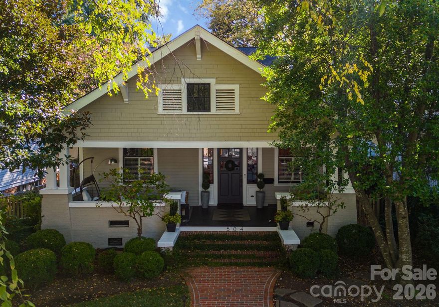 Built in 1917, this bungalow has character in spades: refinished original hardwoods, new oak floors upstairs, high ceilings, four fireplaces, and yes—those wonderful solid wood pocket doors that have stood the test of time.
The main-floor primary suite includes a clawfoot tub, separate shower, and the "ever elusive" large walk in closet. Another downstairs bedroom is being used as an office now, but works great if you’d like little ones close by. Upstairs, the bonus loft is the ultimate flex space—a playroom, game room, or cozy lounge. Plus there are two nice size bedrooms and an updated bath. 
The kitchen is a standout with a Wolf range, Subzero refrigerator, marble countertops, and custom cabinetry. Two living rooms on the first floor give everyone space to spread out, and the front porch with swing is a true Dilworth classic.
Ready to embrace the city-living lifestyle— this is THE prime location! You will love walking to Latta Park, Dilworth Elementary, South End’s shops and restaurants, the light rail, and even the hospitals.
This home is perfect for buyers who want authentic character, walkability, and community—all wrapped up in one of Charlotte’s favorite Historic neighborhoods.