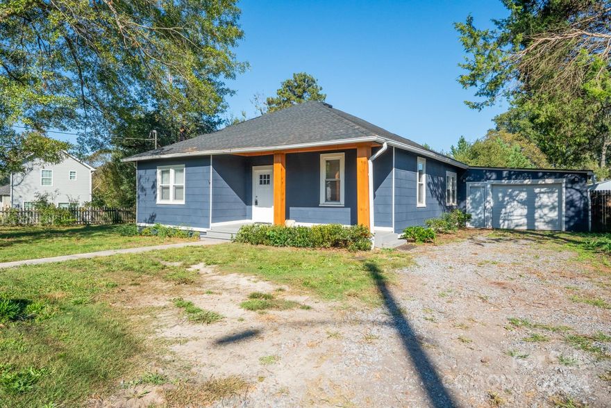 Welcome to this charming historic bungalow, nestled on a spacious and level lot. This delightful home features 3 bedrooms and 2 upgraded bathrooms, offering modern comfort while retaining its vintage charm. Step inside to discover LVP flooring throughout, giving a warm and inviting feel to every room. The kitchen is equipped with newer appliances, perfect for both everyday cooking and entertaining. Outside, you'll find a covered front porch, ideal for enjoying morning coffee or evening relaxation, and a covered back porch, offering the perfect spot for outdoor dining. The fully fenced backyard is a peaceful oasis, complete with a storage shed for your gardening tools or extra storage needs. Parking is a breeze with the one-car garage, providing extra storage space as well. This home is a true gem, offering the best of both worlds—historic charm and modern upgrades. Don’t miss the opportunity to make this sweet bungalow your own!