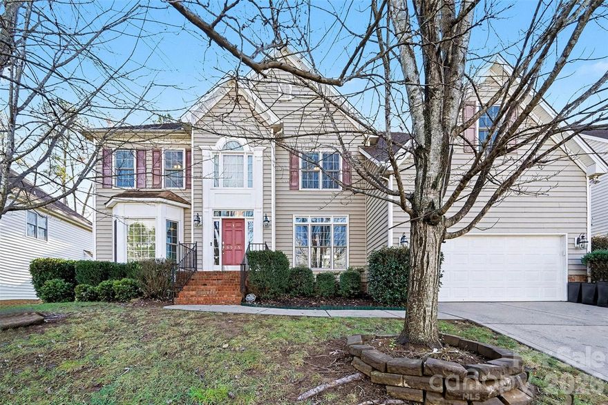 Spacious Highland Creek home located on the desirable Cabarrus County side near the Sports Club, amazing location! Situated on a quarter acre lot, this home offers a beautifully landscaped backyard with a large deck and a paved patio with sitting area, perfect for outdoor entertaining. With over 3,400 square feet of living space, this home includes 5 bedrooms and 3 full bathrooms, plus a dedicated office on the main level, dining room, breakfast area, large laundry room, and upstairs bonus room. The main floor features wood flooring and a two-story family room with fireplace, creating an open and inviting atmosphere. In the kitchen, you will find a double oven, gas range, newer stainless-steel fridge, dishwasher, microwave, and sink and a convenient breakfast area. Upstairs, there are 4 additional bedrooms including the primary with a decorative tray ceiling, primary bathroom with large soaking tub and walk in closet, a large bonus room great for a playroom, workout space, or craft room, Luxury Vinyl Plank flooring on upper level, and the convenience of two separate staircases. Generous room sizes and flexible spaces provide plenty of options! HVAC new in 2023, tankless hot water heater added, brand new backsplash in kitchen, home and driveway freshly pressure washed and more! Conveniently located close to Concord Mills, Uptown Charlotte, dining, shopping, and highways, this home offers both space and an unbeatable location.