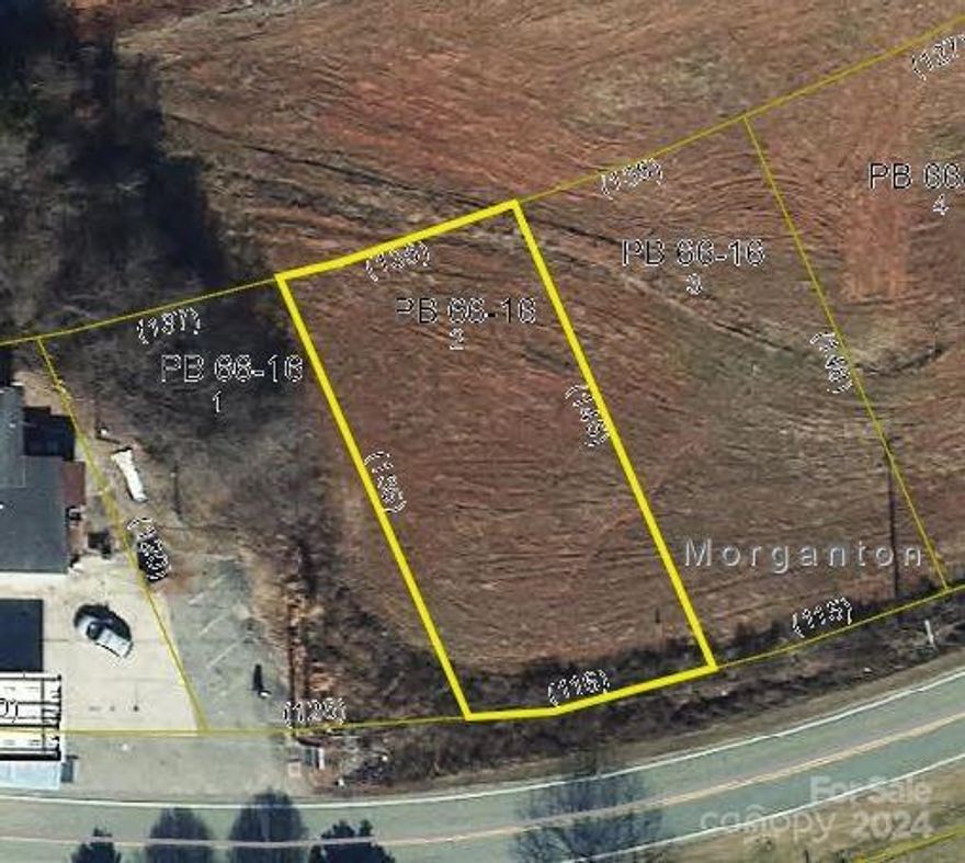 Level ,Large cleared lot located next to big daddy's gas station on highway 70.  City water and sewer.  Will allow a modular homes  site built homes ,tiny homes