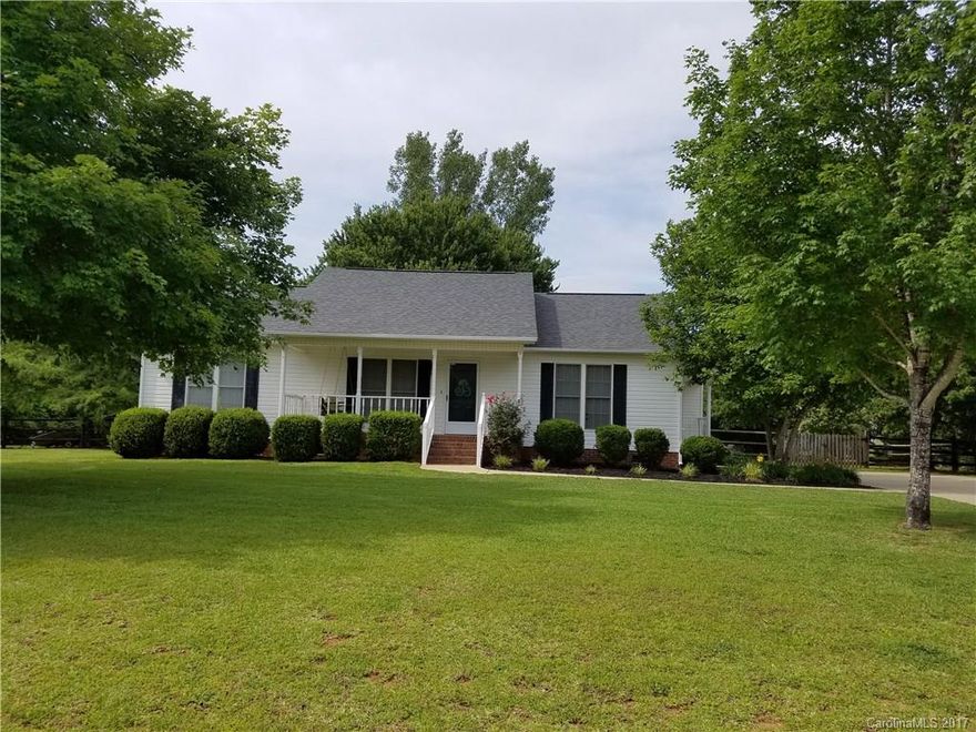 The house you've been searching for is right here! Come make this very charming & beautiful 3 bedroom 2 bathroom home your oasis! This home sits on a sizable 1 acre lot that boasts a beautiful fenced backyard that contains an assortment of fruit trees. Settle into a home with an open floor plan, updated bathrooms, & hardwood floors throughout. Enjoy your evenings relaxing on the front porch and taking in the serenity of a quiet and very desired, well-established neighborhood! Come see today!