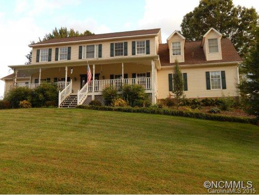 Wonderful large 2 story remodeled home.  Open spacious room with beautiful hardwood floors, fireplace, and exquisite eat in kitchen.  Kitchen remodeled with granite and stainless steel.  Huge dining room for celebrating holidays.  Master suite on main and 2nd level.  Two additional guest rooms or office spaces.  Custom home theater has surround sound, projector, and pop corn machine.  Fenced yard for pets and huge deck for entertaining.