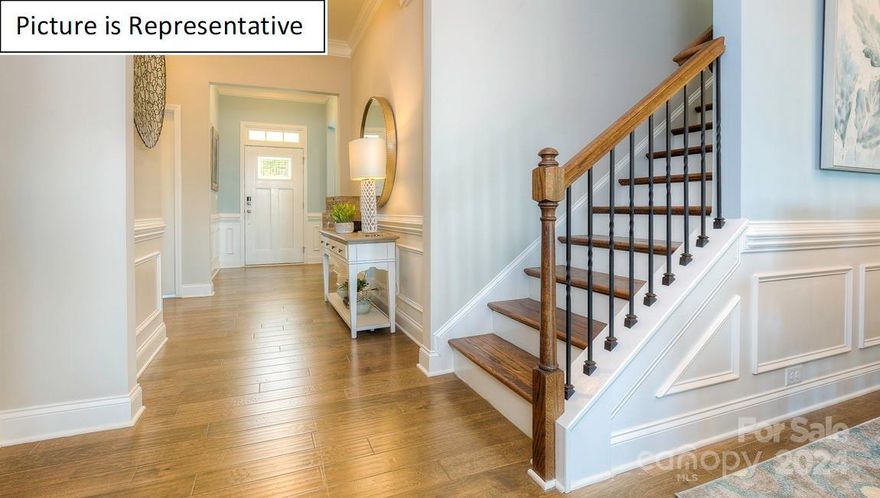 The Award winning Azalea floorplan with the massive 13' Kitchen Island with a stunning 10' ceiling height!  Stylish White kitchen cabinets compliment the quartz counter tops.  Stainless steel Gas cooktop with double oven, microwave and dishwasher are included. Family room features cozy fireplace with mantle.  The Azalea ranch home features primary BR on main level, owners bath with dual sinks, Luxury oversized shower with walk in closet. Proven successful floor plan in Top rated community. Home Is Connected Includes programmable thermostat, Z-Wave door lock and wireless light switch, touchscreen control device, automation platform, video doorbell, and Amazon Echo Dot!  All home features are subject to change without notice. Community will include playground & Pavilion in the main common area, community boat ramp.  Photos are representative and do not include all features.