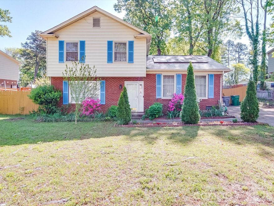 Tucked on a quiet Charlotte . this tri-level home has 4 beds, 3 full baths, and the kind of potential that savvy buyers dream about.It’s loaded with space: expansive living areas, flexible layout, 0.3-acre lot.The home boasts beautiful wood floors, a bright, airy interior,  that brings natural light into the main floor, overlooking the backyard and oversize deck for lots of outdoor activities. While the kitchen and primary bath are in good condition, they're ready for your personal updates. Extended parking lot for you to enjoy. You could transform it. Design it. Flip it. Or make it your forever home with the finishes you choose.The home also features SOLAR PANELS which will help energy bill. And with fast access to shopping, dining, and the freeway—you’re investing in location, too.
 Roof 2021 , and electrical system was recently updated too.