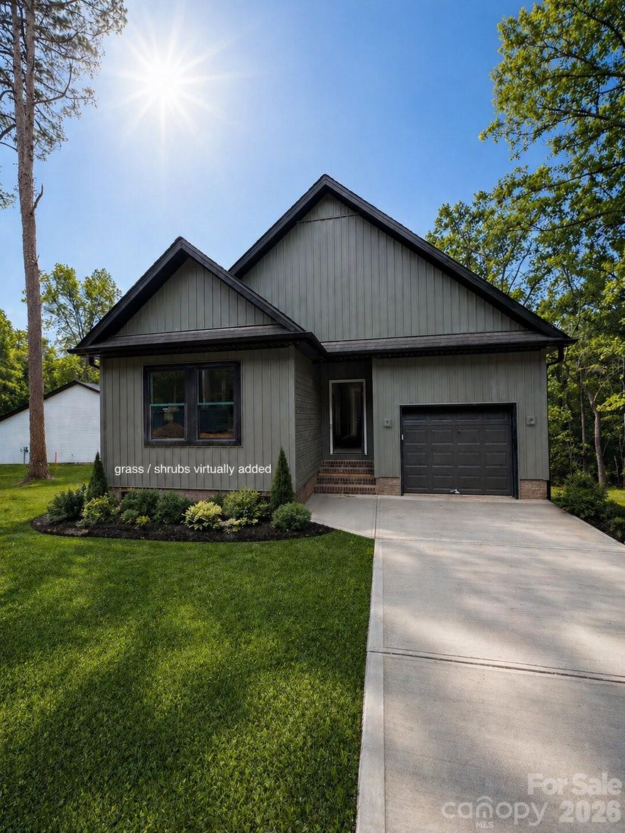 This new 1,240 sq. ft. bungalow features a clean, functional design with a modern color palette. The open floorplan connects the main living area to a kitchen finished with custom cabinetry. Throughout the home, all closets are outfitted with wooden shelving, and the laundry area includes additional cabinet storage.

The primary suite includes an ensuite bath featuring a double vanity and a large, tiled walk-in shower with a double-hinged door, and a walk-in closet. Two additional bedrooms and a one-car garage complete the layout.

Located in the gated Carolina Forest community, this home offers access to Lake Tillery, including a community boat launch, waterfront pool, and clubhouse.