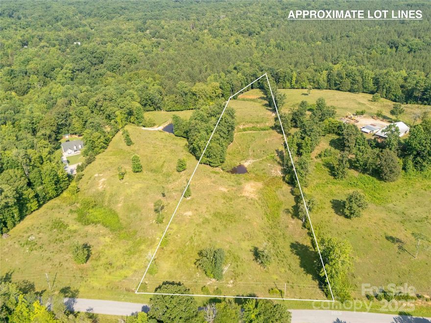 Tucked away on a quiet country road, this 6.82-acre slice of Carolina countryside offers the kind of peace you can’t put a price on. Once pastureland, the property rolls gently across open hills and leads to a small pond that mirrors the sky. Whether you’re dreaming of a private homesite, hobby farm, or weekend escape, the land is ready—mostly cleared, easy to walk, and full of potential. Picture morning coffee on a front porch overlooking misty hills, or evenings by the pond as the sun dips low. With no HOA and plenty of space to spread out, this is your chance to claim a rare blend of freedom, beauty, and possibility—just minutes from downtown York.