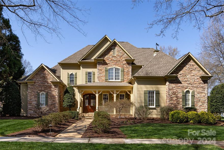 Former Homearama model home with lots of bells and whistles! Stunning Keeping Room with stacked stone fireplace, built-ins, vaulted ceiling with solid cedar beams  -  open to the Kitchen featuring honey toned cabinetry w/copper detailing, center island, SS appliances and built-in wine bar. Five inch white oak hwoods, custom plantation shutters & tremendous moldings. Primary BR on main with tray ceiling & spacious Bath with His & Hers walk-in closets, jetted tub & oversized glass enclosed shower. Two-story, vaulted ceiling in LR w/white built-ins and gas fireplace.  3 Bedrooms upstairs, plus Bonus Rm and Office. ~ Resort style back yard with a covered porch w/heaters, outdoor fireplace, heated ozone pool with waterfalls, tanning ledge, fire urns, in-pool umbrella and sunken hot tub. Travertine tile pool surround and stone patios. Custom cabinetry in the immaculate 3-car garage with epoxy flooring. Stone walkway to the front door and brick paver driveway....quality upgrades throughout!