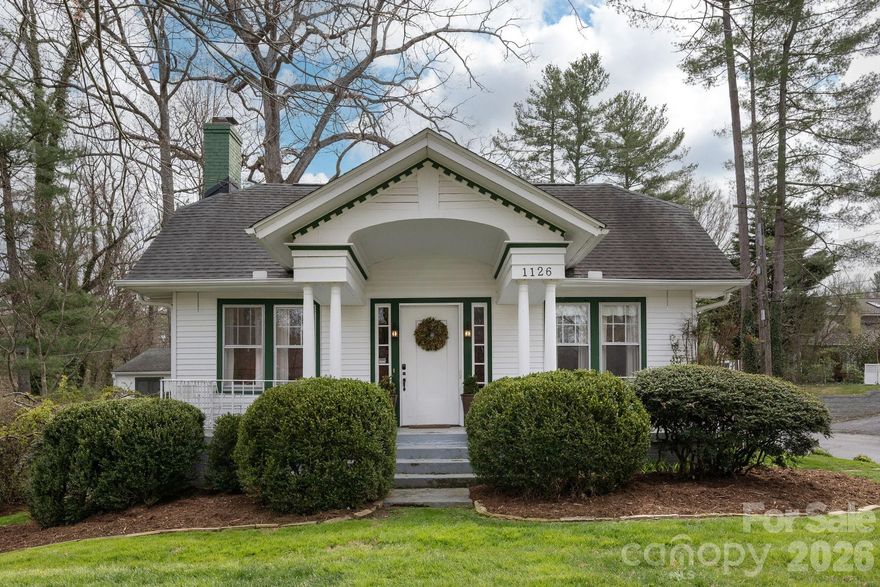 A rare opportunity to own on 4th Avenue...arguably the best street in Hendersonville. This magical property offers beauty and enchantment with its gorgeous yard and gardens, sprinkled with flowering trees and perennials. There is plenty of outdoor living and entertaining space with the expansive deck and fenced in back yard for your furry friends or play. The home offers plenty of charm with its fireplace, built ins, 9 foot+ ceilings, original hardwood floors and the convenience of an updated kitchen and bathroom. The detached two car garage only steps to the back entrance adds convenience and plenty of storage opportunity. The space with half bath off the garage could be used for many uses including storage, exercise or hobbies. The fixed stair walk up attic offers additional convenient storage space. This unique home is also within walking distance to Main Street Hendersonville and only 2 blocks from the Ecusta Trail access. Location and charm make this a perfect 4th Ave. West property! Come see it today!