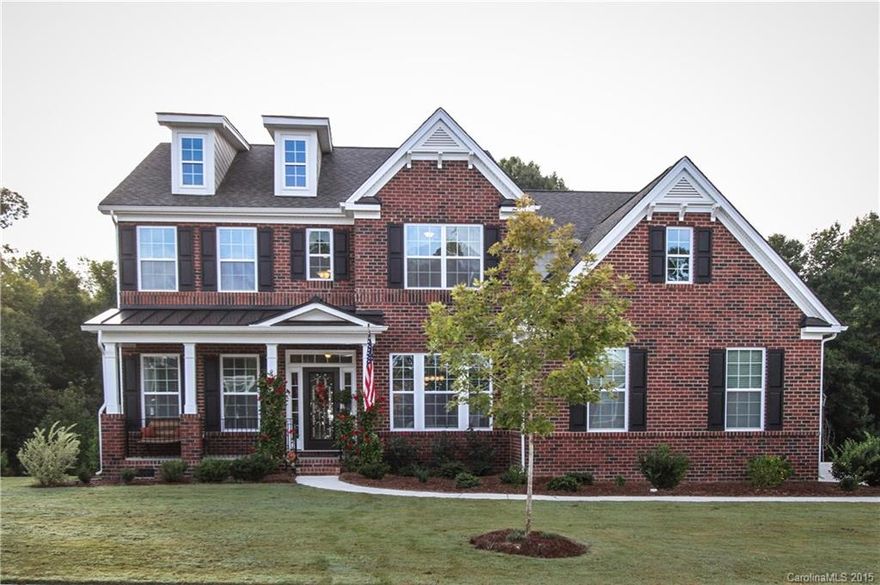 Stunning 2 Story Hardy Planked home with full Brick front featuring 5 bedrooms, 3 full baths and breathtaking gourmet kitchen. Granite counter tops in kitchen and all bathrooms. Hardwoods down and tile floors in all wet areas. Study, Formal Dining Room and Guest Suite on main. Master Bedroom, 3 secondary bedrooms, laundry and beautiful bonus room on 2nd level. Great Family Oriented Community with Amenity Center, pool, tennis courts and 24 hour fitness room. Fort Mill Award Winning Schools.