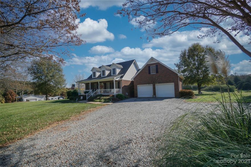 Great home located in the desirable rural area of Locust with approximately three acres of land.  Basement is partially finished and has fireplace with gas logs.  Primary bedroom with primary bathroom is located on main floor.  Bonus room over garage has been finished.  Outside, there is a 24x30 garage with concrete flooring and electricity.
There is also another outbuilding, 24x24 that is wired with a fenced in area.