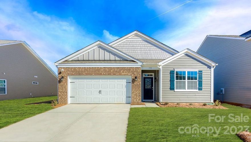 Welcome to the beautiful Hickory Ridge neighborhood in Mars Hill, North Carolina. The location is absolutely breathtaking with mountain views all year round. This listing is for a "CALI floor plan, which is 1,764 sq-ft with 4 bedrooms and 2 full baths, all conveniently packaged in a one-story setting. Some of the notable features include 9-foot ceilings, mohawk flooring, gas fireplace, vaulted ceilings and modern connectivity. In the kitchen you will find granite countertops with 4-inch backsplash, shaker style cabinets and whirlpool stainless steel appliances. The Connected Home package includes programable thermostat, security system pre-wire, video doorbell, Echo Dot. The 2-car garage is the icing on the cake!