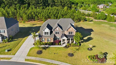 Photo of 1020 Liggets Drive, Matthews, NC 28104 (MLS # 4369265)