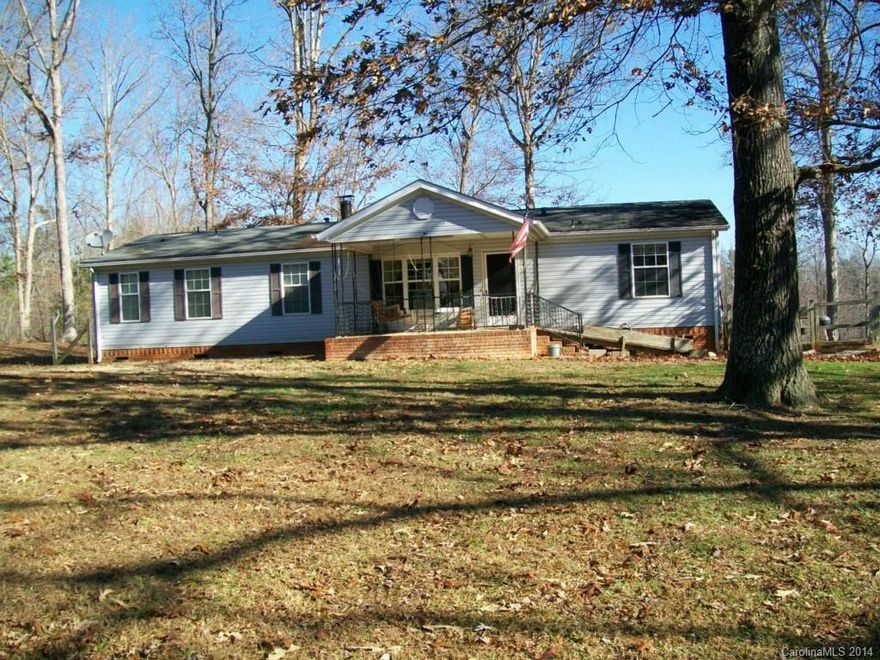 Country Living. Nice 3 Bedroom 2 Bath Doublewide on 5.5 acres. Large living room with wood burning stove. Covered concrete front porch, handicap accessible. 12x18 Deck, storage building, 2 car carport. Priced to sell.