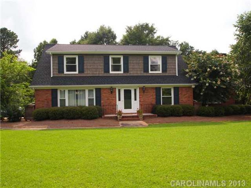 Contingency contract - still show!!  On the golf course! 1.5 Ac. lot with frontage and beautiful views of the 13th fairway. Great two story home with new roof, siding, windows, gutters, kitchen cabinets, granite countertops, ceramic tile floor, fresh paint and new carpet.  Lg. bedrooms, master on main, screened porch, new deck, storage, NO HOA!  Private, mature trees & azaleas.