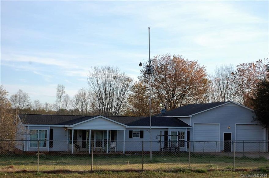 Zoned Residential and Commercial.  Great road frontage right on Hwy 11 only 4.5 miles from I-26.  Currently being used as a rental. HUGE 2 car garage with large storage room/workshop/office space & exterior access to back yard. Spacious home w/ split bedroom floor plan, lots of kitchen storage & counter space w/ island, & gas log fireplace. Business license for previous use is still in place. Tons of opportunity for this property and location!