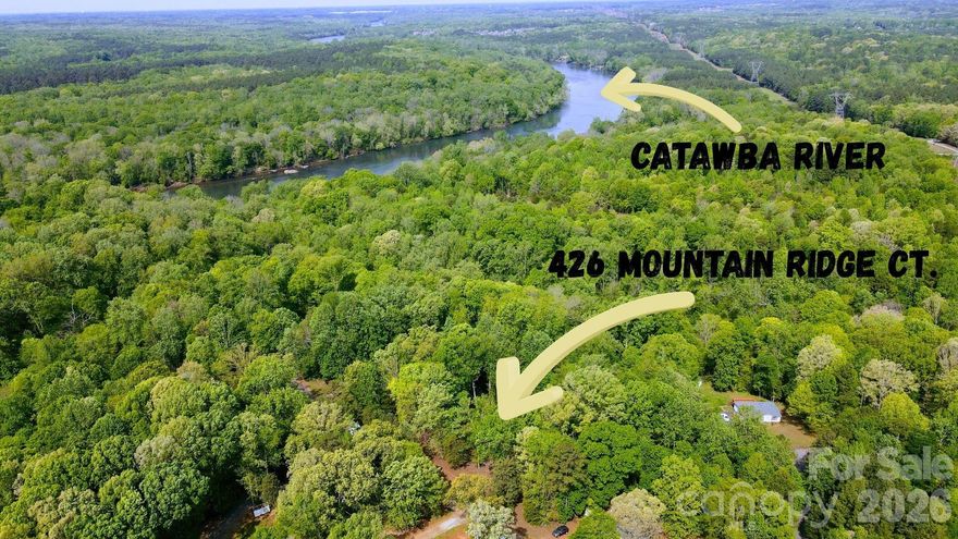 Tucked quietly off Hwy 521, this private 1.43-acre cleared homesite offers the rare chance to build your dream country estate while staying close to everything the booming Indian Land, Fort Mill, and Ballantyne areas provide. Set within a peaceful, tucked-away neighborhood, the land feels like a retreat—yet shops, dining, and everyday conveniences are just minutes away. Enjoy the Catawba River, where you can enjoy kayaking this summer.  With low South Carolina taxes and access to the highly regarded Indian Land schools, this property blends serenity, practicality, and long-term value in one exceptional setting
