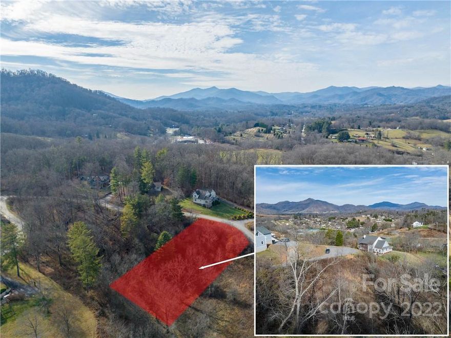 Wonderful lot in upscale neighborhood with several active new homes under construction for your mountain home. Close to shopping, I-40, Asheville, and Waynesville.  Come take a look!