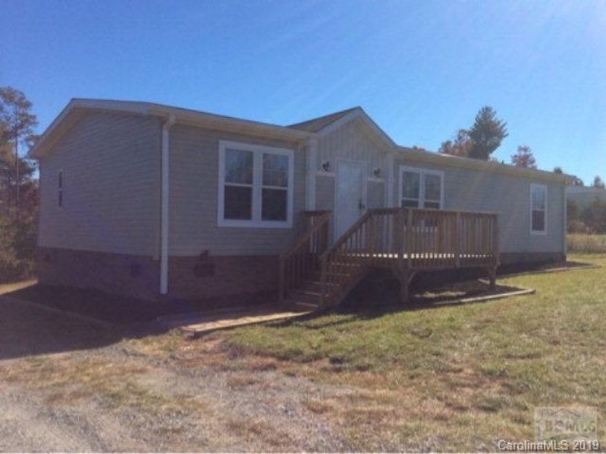 Like New 2012 Clayton Double Wide on .56 acre lot. Island Kitchen Glamour Bath Garden Tub Separate Shower His and Hers Vanity Stipple Finish Ceilings Upgrade doors and cabinetry Eat in Kitchen Energy Efficient New Floor Covering Financing Available Low Scores ok with 10% dn Better scores 5%.