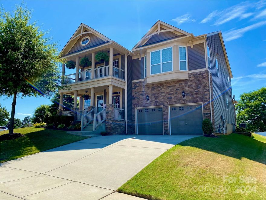 This lofty home combines resplendence, comfort, convenience, flexible spaces, modern amenities, & prime location, making it an ideal choice for your next move. The airy main level offers 9’ ceilings & 8’ doors, real hardwoods, a gas fireplace, & recessed in-ceiling 5.1 surround sound. The kitchen has stainless appliances, a large pantry, tile backsplash, & 11-stage RO filtration system w/ remineralization. French doors lead to the sunroom & the den can be used as office, workout, playroom, or guest suite. Oversize primary w/ tray ceiling, ensuite bath, & dual closets.

Striking corner profile, large backyard. Expansive top deck & porch, overlooking playground. High-ceiling garage w/ ample built-in storage. Community pool w/ slide & water features, staffed guards. Dual-zone intelligent thermostats, lighting, & fiber internet. Concrete, pressure washed & sealed, annually.
Prime location! I-77, Lowes Corporate, LNRMC, healthcare, Pine Lake Prep & both Langtree campuses.

*Agent Owned