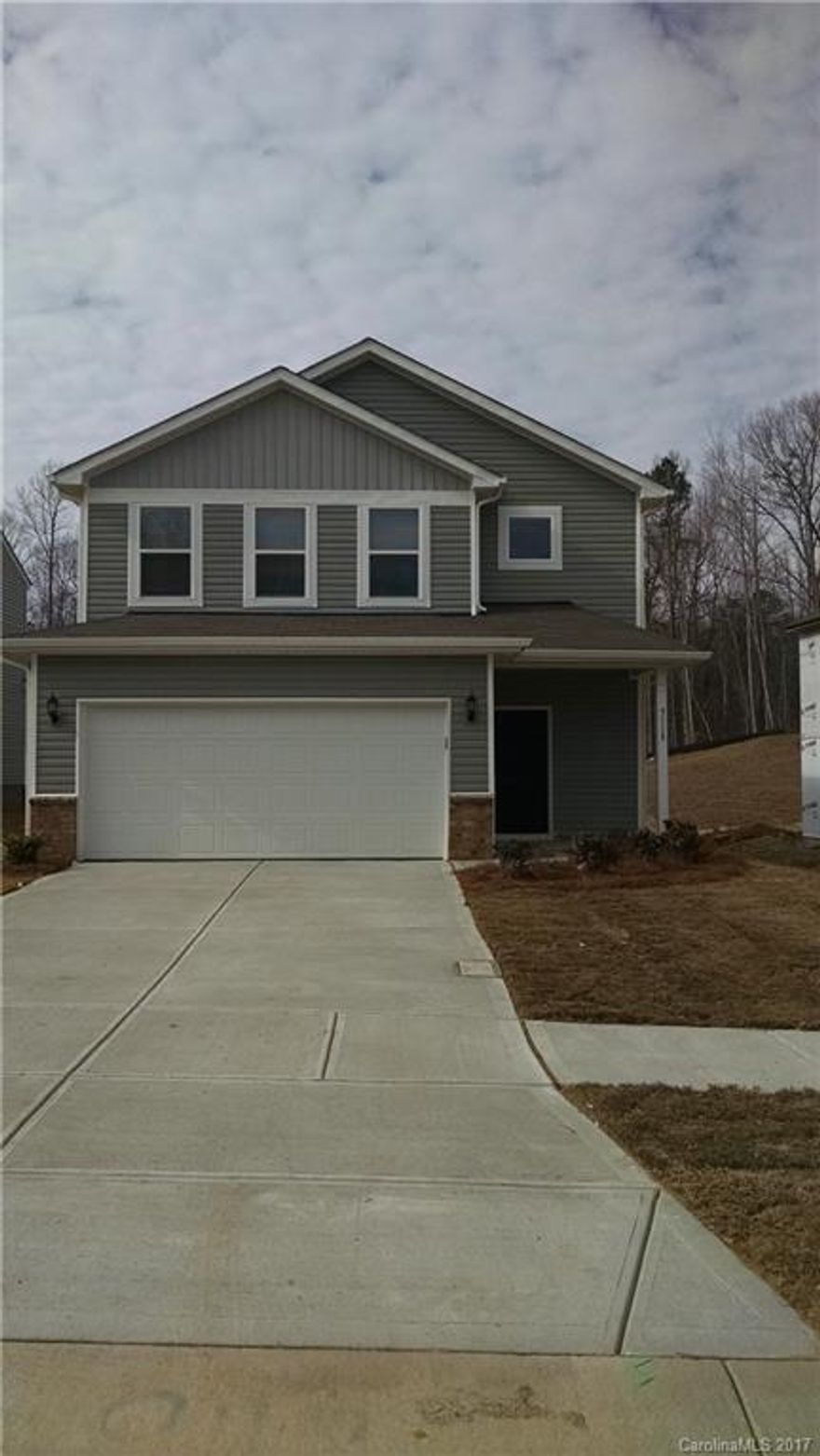 9 Foot ceilings on 1st floor,Raised Panel Cabinets w/ Crown, Recessed Can Lights, Granite countertops and Bar. Stainless Steel GAS Range, microwave /dishwasher, and Fridge. 5 Ft Walk In Shower, double bowl vanity in Master Bath, Loft on 2nd Floor, Guest Bedroom on main Floor with full bath.Upgraded Oil Rub Bronze Finish Package. 2” Blinds Installed.   Fully Sodded Yard. Seller pays up to $6500.00 in closing cost with preferred Lender. House is Complete, Move in Ready