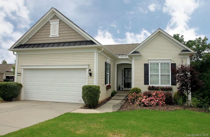 Copper Ridge w/ Basement, Sunrm, & Covered Paver Patio w/ Built In Garden! Great for Entertaining – Screened Porch & Extended Deck w/ Stairs to Patio. Corner Lot Overlooks Wooded Area w/ Views in Most Rooms. Tons of Upgrades - Hardwoods, Crown Molding, Ceiling Fans, Shelving, & Fixtures. Kitchen w/ Granite Counters & Under Cabinet Lighting. Superior Wall System Finished Basement - Tons of Storage. Convenient Location to 2nd Amenity Center & Walking Trail to River & Recreation Area. 55+ Community