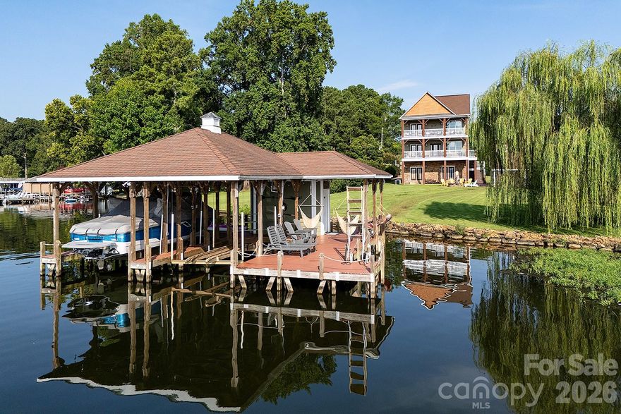 Luxury Waterfront Escape with Strong Short-Term Rental Potential! This fully furnished custom home offers 85 ft of pristine shoreline and sweeping lake views from two expansive balconies. The main level features a stylish living room with fireplace, open dining, and a well-appointed kitchen that is ideal for entertaining. The luxe Primary Suite boasts balcony access, lake views, and a spa-like bath with soaking tub. Upstairs includes one bedroom, two additional sleeping rooms, and a full bath. A spiral staircase leads to the lower level with a spacious rec room, second kitchen, and wet bar. With charm, character, and an unbeatable location, this home is perfect for lakeside living and offers excellent short-term rental income potential on top of it!