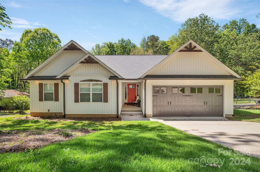 Ranch with Basement in Tega Cay! Built in 2021, NO HOA, Beautiful! Fenced backyard, garage. Open Floor plan, Great room has vaulted ceiling, skylights, fireplace, & dining area. Kitchen has white cabinets, granite counters, Island, Walk in Pantry & computer/desk area. Stainless appliances include 5 burner gas range, French door refrigerator. Primary Bedroom has vaulted ceiling & large walk in closet.  Primary bath: walk in tile shower, granite counters & tile floors. Bedroom 2 on main, walk in closet & full bath. Laundry room on main, utility sink & drop zone. Lower level basement large bonus room, wet bar with cabinetry, granite counters & refrigerator. Flex/office space, plus walk in storage room.  Bedroom 3 & 4, full bath & walk in shower. Walk out basement patio & deck. On the peninsula of Tega Cay on Lake Wylie.  Amenities include beaches, waterfront parks, boat ramps, pier, sport courts, trails, pickleball, tennis, Tega Cay Beach & Swim Club, Golf Club, marina. Fort Mill Schools.