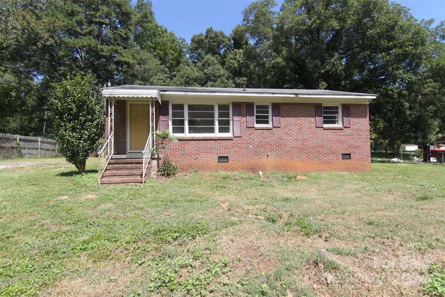 Ranch home with a large yard. Fresh paint & hardwoods throughout. Large living room. Updates in bathroom.