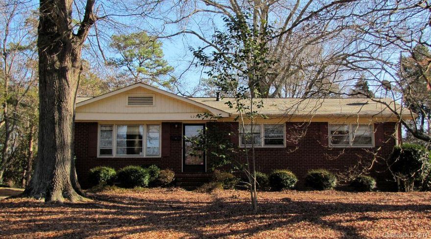 This cute 3-bedroom ranch features hardwoods throughout, except in the kitchen and baths, which have tile. The bright kitchen has gas cooking and is open to a large dining area. This home is located on a large lot with lots of shade trees. The back yard is fenced, and also includes a spacious deck -- perfect for outdoor entertaining -- as well as a storage shed and outside storage rooms. Lawn maintenance is included in the rent price. Minutes to South Blvd, Tyvola Rd and the Southpark area!