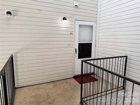 Photo of 9123 Spyglass Place #I, Charlotte, NC 28214 (MLS # 4382402)