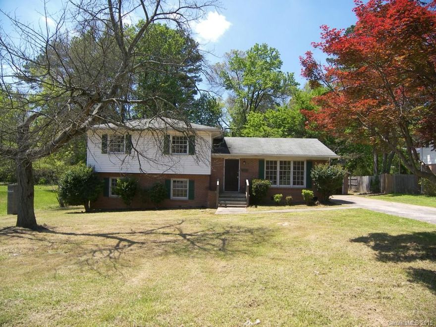 This split level home features 3 bedrooms and 2 full baths on the upper level. Bonus room with closet on the lower level with den and fireplace. Large front and back yard, covered back patio and detached 2 car garage. Easy access to I-85 and Tryon. First look period:  No offers entertained for the first 3 days. After 3 full days offers open for owner-occupant, after 20 full days offers open for investors.