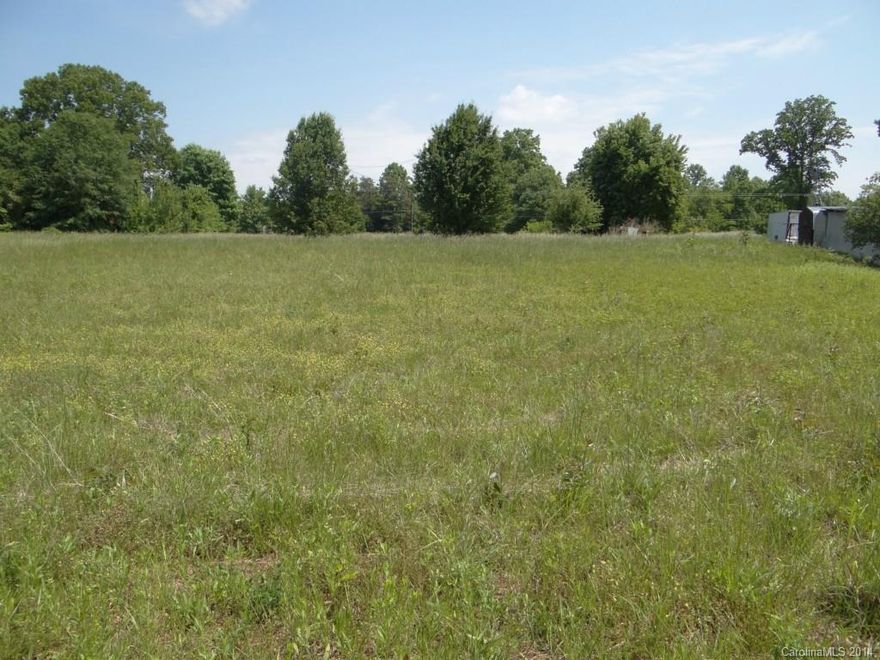 Large flat building lot out in the country.  This lot is very deep to situate your home off the road.  Ready for you to bring your own builder.  Manufactured homes are not allowed per neighborhood zoning.  This lot goes to the fence at the back of the lot.  Corners are marked from recent survey.  Agent is related to owner.  Neighboring lot also for sale by same owner if you want more acreage!