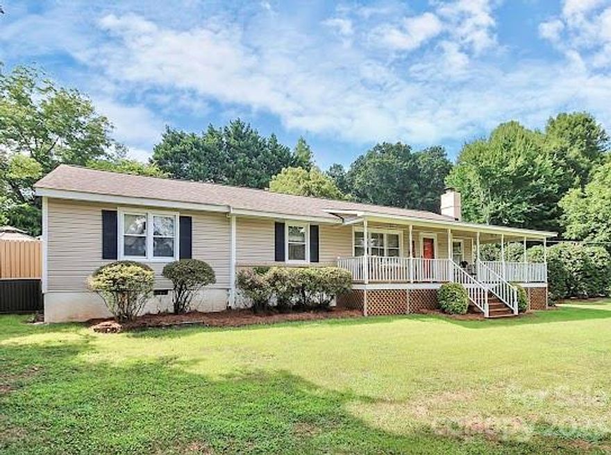 Welcome to the Fort Mill Golf Community. Enjoy entertaining on the wrap-around porch. Relax and watch golfers on the 8th & 6th tee box. One of the four Bedrooms with a separate entry could be a Mother-in-law suite, Guest Quarters, Game Room or spacious office. Cozy up to the Beautiful Corner Stone Fireplace and enjoy the warmth of the multiple windows. A full Bathroom is just steps away. Large Family Room Open to Kitchen & Dining area with laid-in place, oak hardwood floors, The focal point of this room is the spectacular Rock Fireplace with huge, aged  timber mantel, Granite Counters abound in the Kitchen with a Gas Cooktop in the Island, Instant Hot Water at the Kitchen Sink  and a new refrigerator. A She-Shed near the privacy fenced back yard. A Wired Work Shop & a Well for your vegetable or flower Garden. House fronts on Country Club Drive but driveway is on Howington Circle. Walk to downtown Fort Mill for all the fun activities, shops & restaurants. Excellent Fort Mill Schools.