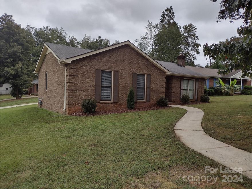 Sparkling, renovated Mint Hill 3 Bedroom 2 Bathroom Brick Ranch house in the McAlpine Woods neighborhood. Gorgeous updated KT, spacious Great Room, Dining Room, Kitchen complete with Range/Oven, Refrigerator, Dishwasher & Microwave, plus a beautiful Sun Room.  Both bathrooms features sleek bathing areas with tiile and sparkling glass.  Laundry closet. Built in 1990. Gas heat and Central Air Conditioning. Exterior of this home features a large wooded corner lot and a storage building. Very close to shopping, restaurants, entertainment and easy access to uptown. Pets negotiable/NO SMOKING.