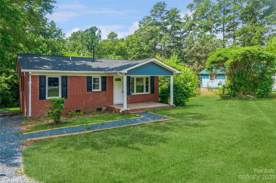 Brick Ranch Home Updated with new roof, windows, doors, flooring, kitchen and bathroom.  Granite countertops, cabinets and appliances in large open kitchen with laundry closet and breakfast area.  Additional updates include Central heat/air, front porch, rear deck and light fixtures/ceiling fans.  Don't miss this one!