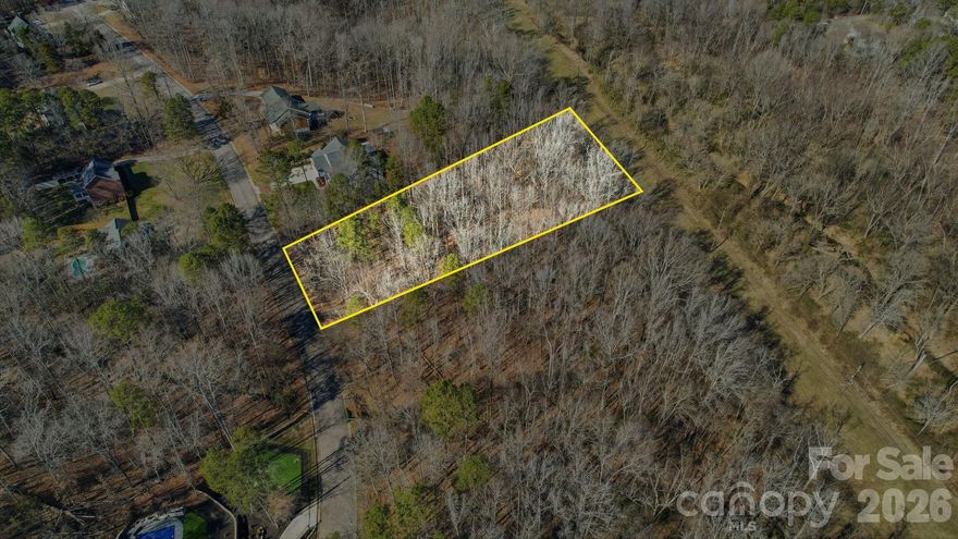 Beautiful 1.25 acre wooded lot minutes from downtown Concord in the highly desirable Preserves at Coldwater Creek. Lot partially in the 100 year flood plain. Buyer to verify information.