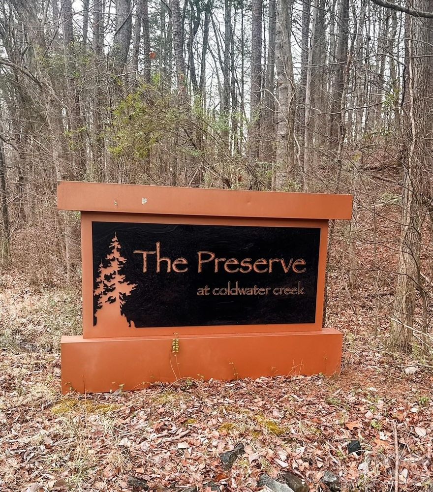 Beautiful 1.25 acre wooded lot minutes from downtown Concord in the highly desirable Preserves at Coldwater Creek. Lot partially in the 100 year flood plain. Buyer to verify information.