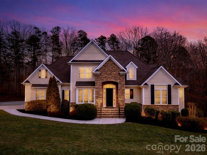 A rare opportunity to own a home that combines flexible multi-generational space with secondary living quarters, a private backyard pool retreat,  and perfectly positioned in a desirable Troutman location near Lake Norman and Lake Norman State Park.
This is an original custom-built home designed for flexible living and entertaining. The finished walk-out basement functions as its own living space, featuring a large recreation room with projector screen wall, a second kitchen, full bathroom, exercise room, and additional flex room that could be used as a bedroom, teen suite or office. This level features extensive storage areas too. French doors lead directly to the pool patio, making this level ideal  for pool days. Whether it’s guests, extended family, or multi-generational living you need this home offers it all.
Stepping outside you find a  16' x 33' in-ground saltwater pool with tanning ledge and diving board, bordered by Tennessee rock. The backyard is tree-lined for added privacy thanks to nature.. The sundeck was rebuilt in 2025, creating the perfect setting for outdoor entertaining and summer gatherings. The fenced yard also includes a wired storage building .  There is also an overflow parking pad that is perfect for boats, recreation vehicles or just more cars.
Inside, the main level features natural wood floors, granite countertops, honey-maple cabinetry in the main kitchen, and a bay-window breakfast room overlooking the pool. The spacious primary suite includes a tray ceiling, bay sitting area, two walk-in closets, jetted tub, double vanities, and walk-in shower with dual shower heads. A second bedroom on the main level offers flexibility for guests, nursery, or office space. A main level primary suite and a secondary bedroom on this level is super hard to find!
Upstairs you’ll find two additional bedrooms, an enormous bonus room with eave storage. New carpet installed in 2026 in all carpeted spaces.  This home has so much storage you won't ever run out of space  for anything!
Additional features include a  water filtration system, garage heater, 220 outlet service in garage that is 30 amp with a 50 amp outlet. Located in a neighborhood with covenants in place but no HOA dues at this time, and just minutes from Lake Norman State Park, Lake Norman boating access, Troutman, and Mooresville amenities. Less than 5 minutes to Duke Power State Park for days on the lake!  Convenient to Mooresville too for shopping.   I-77 and I-40 are also convenient no matter where work or play may take you.   This one has everything you need.