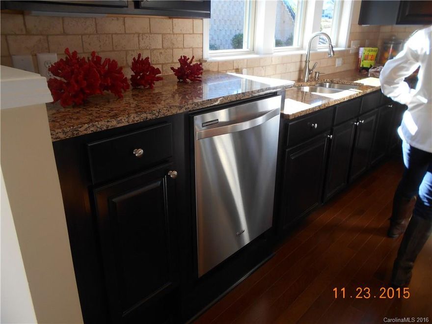 Popular Martin Ray floor plan with wonderful upgrades including a fireplace and sunroom!