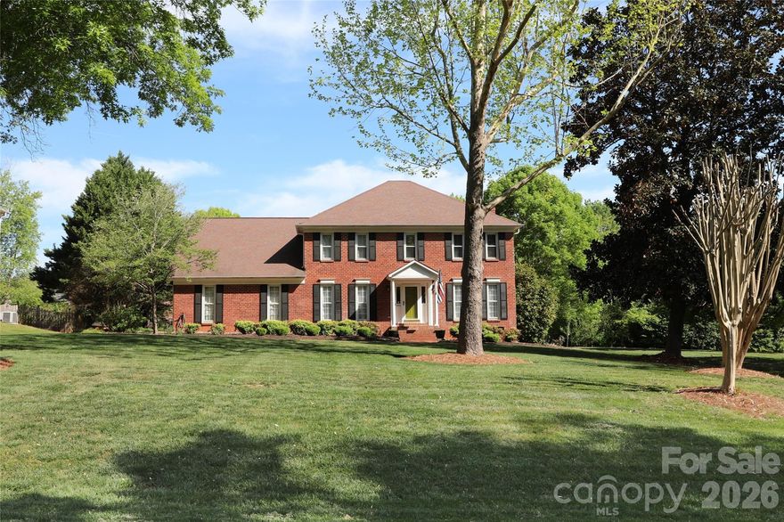 Full brick meticulously maintained 4 bedroom PLUS Bonus Rm AND Office on over half acre level lot in charming Glencroft with hardwoods on the main level. Home offers the perfect blend of open space alongside designated spaces for making the optimal use of the home as needs change. Kitchen offers ample storage and counter space and is open to family room with masonry wood-burning fireplace. Remodeled laundry room and pantry with custom shelving for easy organization. Front living room can easily serve as office space. From family room, updated sliding glass door leads to oversized Trek deck with hot tub and gazebo overlooking beautiful level rear yard. Custom fire pit adjacent to deck for enjoying cooler evenings. Upstairs the spacious primary suite includes a remodeled primary bath (2023) with custom linen pantry and beautifully updated tile. Upstairs also boasts 3 secondary bedrooms, a large hall bath with dual vanity, and large bonus room with recessed lighting. Renovated half bath on main (2022). Oversized garage (over 600 sq ft!) with large workshop area, epoxy floor, and ceiling fans makes for comfortable usable additional space to flex with your needs. Two walk-in attics. 12 x 16 shed with roof replaced 2022. All lighting updated (2022) Crawl space sealed with dehumidifier (2022). Water softener and UV light filter (2020). Gutter guards for easy maintenance! Septic pumped 9/25 and well pump replaced 7/25. Termite bond in place. Don't miss the custom tall baseboards and moldings! Conveniently located close to downtown Mint Hill and Mint Hill Memorial Park. Quick access to 485! Please do not visit property without an approved appointment.