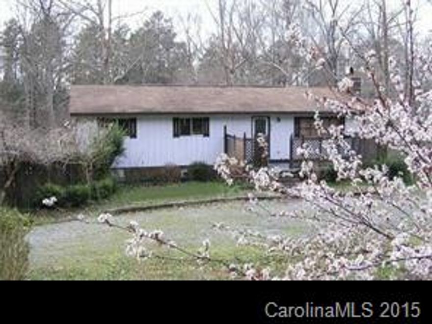 basement has area that was heated.  upstairs needs lots of work.  large laundry room.  fireplace.  creek at rear of property