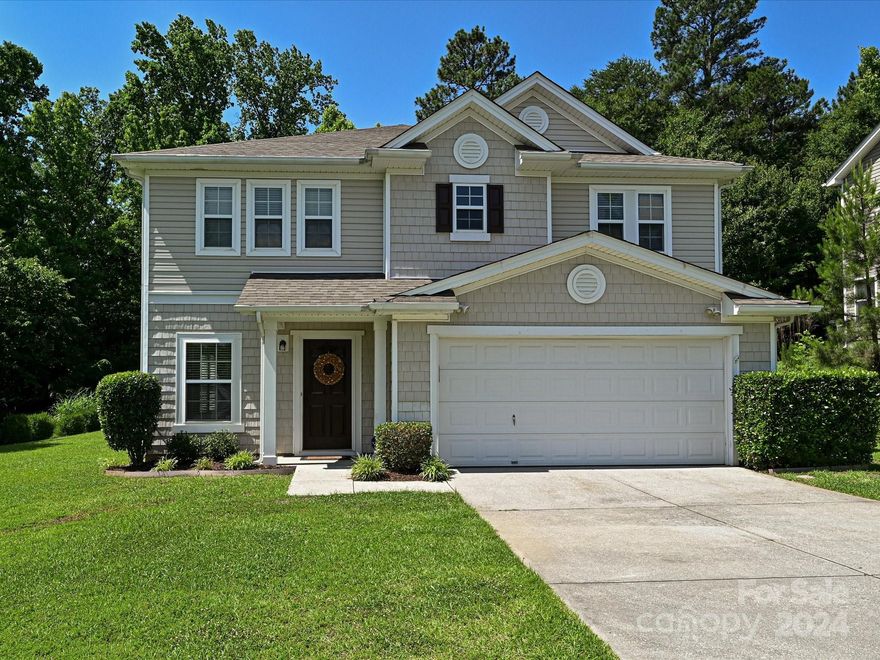 Spacious 5 bed 2.5 bath PLUS loft. This beautiful home has plenty of room for everyone! Open floor plan. Huge kitchen w/ample cabinet and counter space.  Extended concrete patio w/wooded private backyard. Perfect for entertaining. Brand new carpet and freshly painted. Roof replaced in 2021. Don't miss the "secret" bedroom on the main. Large primary w/oversized walk in closet. Primary bath features a separate shower & garden tub. Outlet and meter for a level 2 EV charger added in the garage. Enjoy the neighborhood pool and playground. LOCATION! LOCATION! Conveniently located near I-77 & I-485, minutes from entertainment, shopping & dining. PLUS award winning Fort Mill schools!